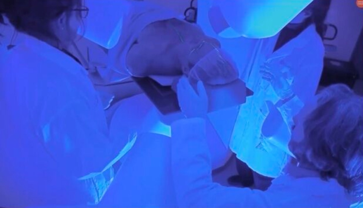 PolarTrak — clinicians preparing a patient under the gantry